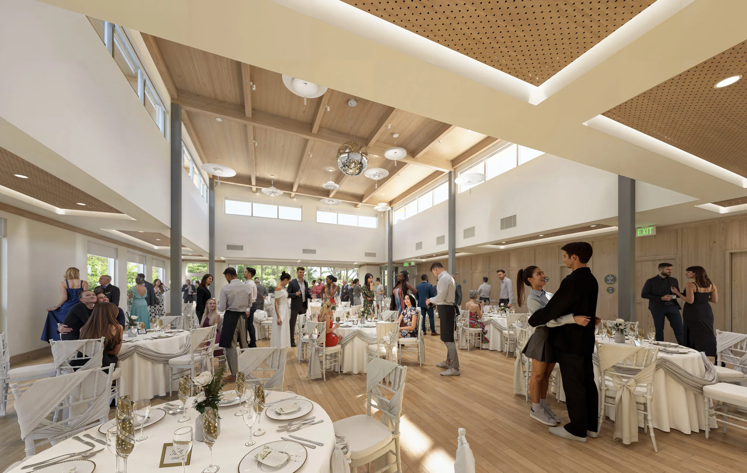 Bright, spacious banquet hall with a high wooden ceiling and skylights. Guests in formal attire mingle beside elegantly set round tables, creating a lively, joyful atmosphere.