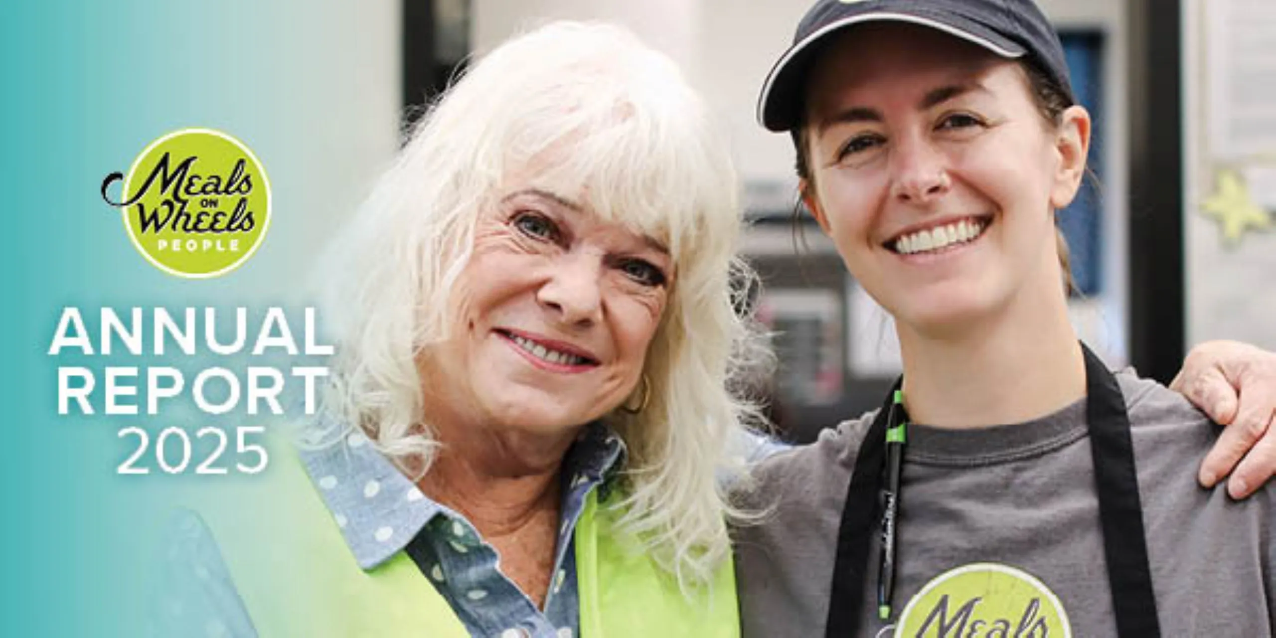 Two women smiling warmly, one older, wearing a green vest, and one younger in a gray cap, featured on the Meals on Wheels People 2025 Annual Report cover.